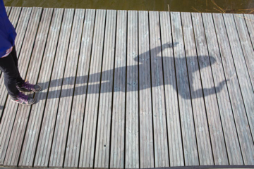 Girl jumping on a pier - Pixbuster Free Images